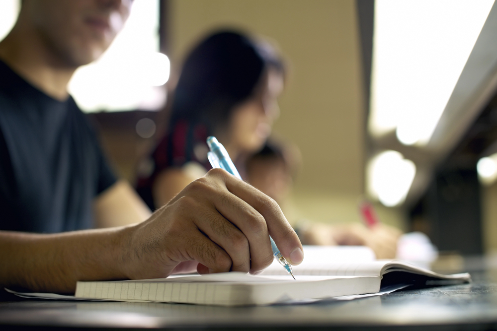 students taking a test in class