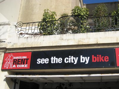 Sign for renting a bike in Barcelona to show that even in non-English speaking contexts, English is all around.